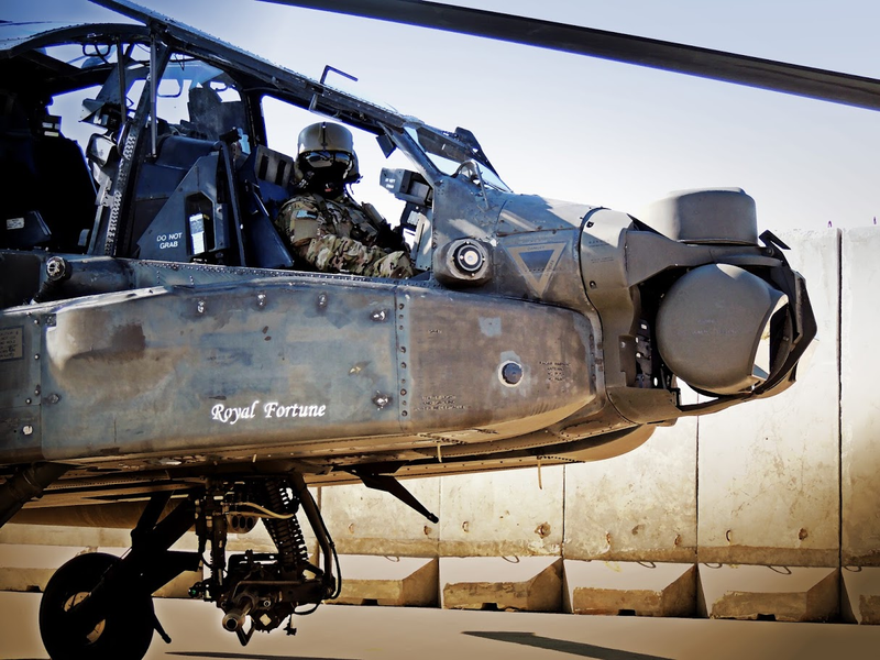 Illustration for article titled One Of Our Readers Is Flying Apaches In Afghanistan And Really Knows How To Use A Camera